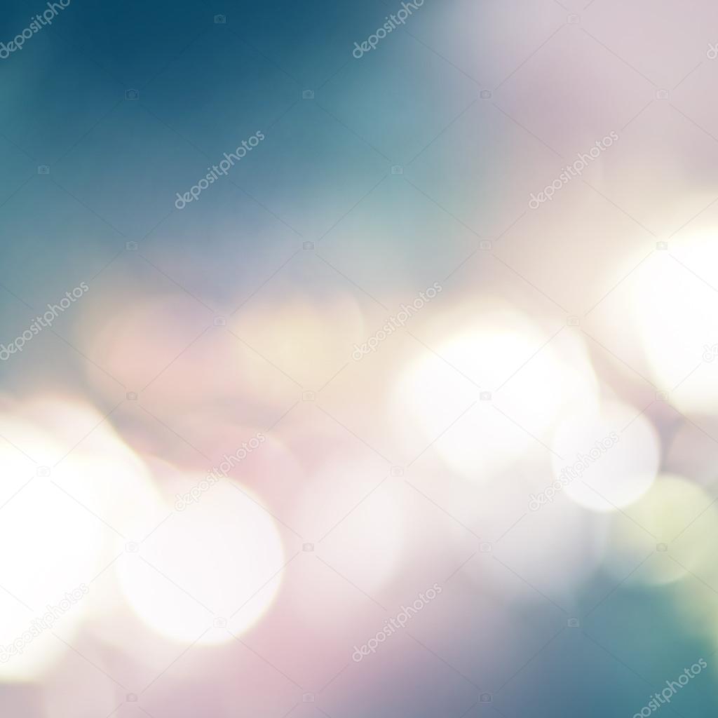 Light Fires and color Spots. Pastel colors white, blue, pink on abstract Background