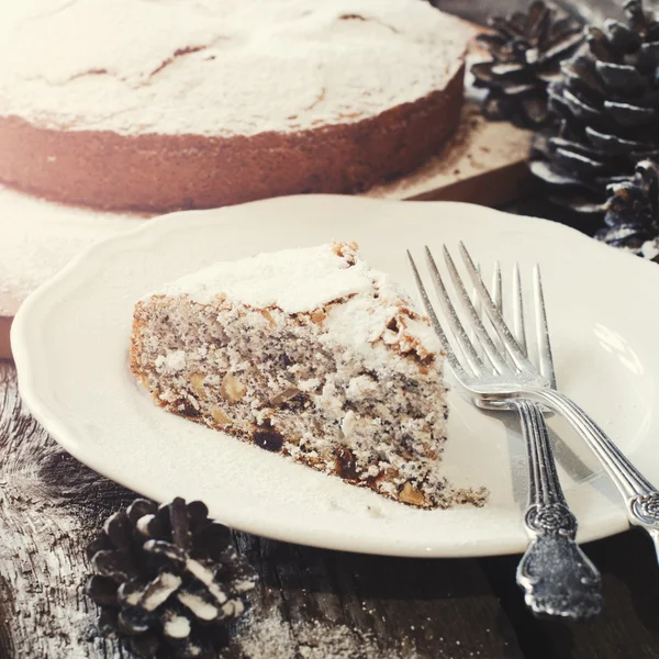 Portion of Christmas Pie with Powdered Sugar on White Plat — Stock Image Portion of Christmas Pie with Powdered Sugar on White Plat Royalty Free Stock Photos