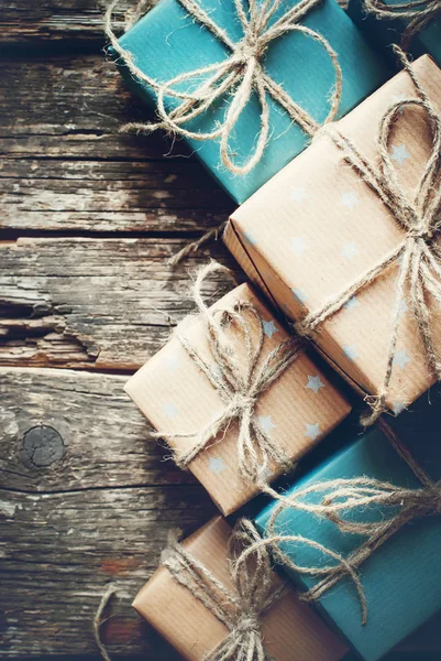 Festive Boxes are Packed into a Brown Paper with Linen Cord — Stok fotoğraf