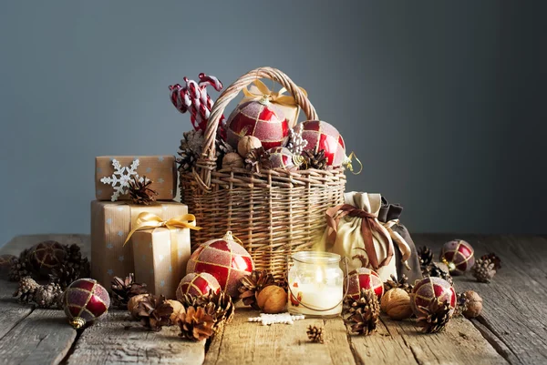 Christmas Composition with Gifts and Burning Candle — Stockfoto