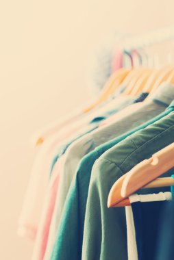 Color Woman Clothes on Open Hanger