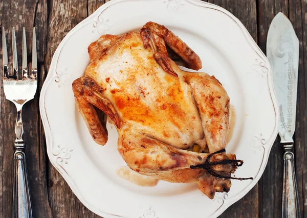 Chicken Grill Baked in Oven. Vintage Plate on Wooden Table