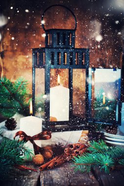 Festive Candles, Cinnamons, Pine cones in Christmas Composition