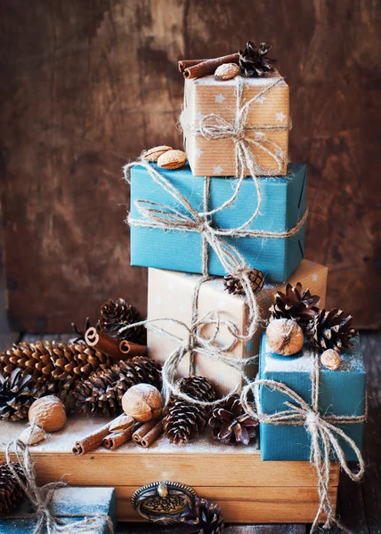 Stack of Festive Boxes with Cords, Natural Gifts. Vintage style — Stock Photo, Image