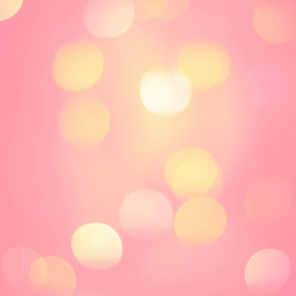 Pastel desenfocado rosa amarillo luces de color. Fondo festivo — Foto de Stock