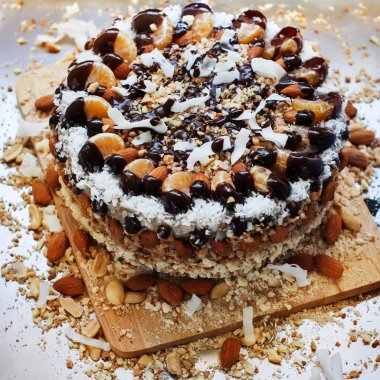 Rich Christmas Cake Decorated with Glazed Fruits, Nuts
