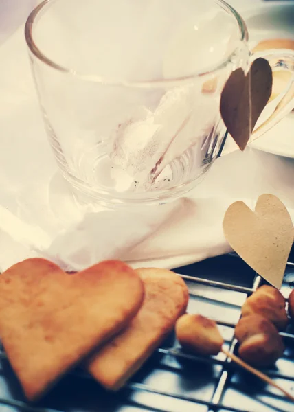 Tea Bag in Glass Cup with Gingersnap. Form of Hearts — Zdjęcie stockowe