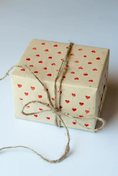 Gift in Handmade Paper with Red Little Hearts Pattern — Stok fotoğraf