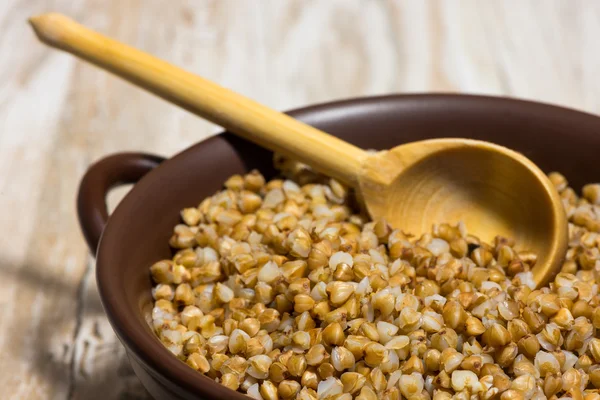 Buckwheat cereal wooden spoon — Stock Photo, Image