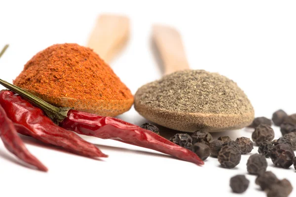 Powdered pepper red and black — Stock Photo, Image
