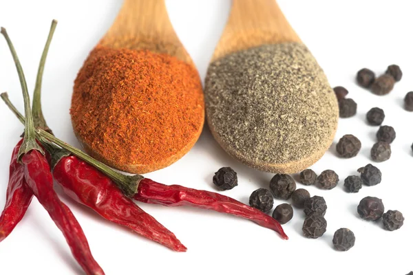 Powdered pepper red and black — Stock Photo, Image