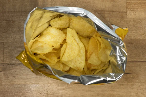 Potato chips in an open bag — Stock Photo, Image