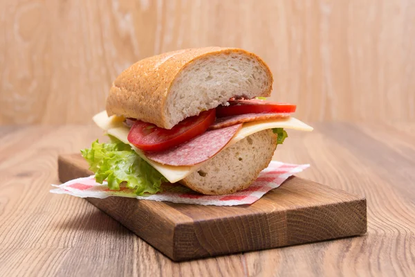 Sandwich with cheese and sausage — Stock Photo, Image