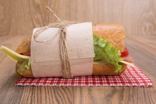 Sandwich with cheese and sausage — Stock Photo, Image