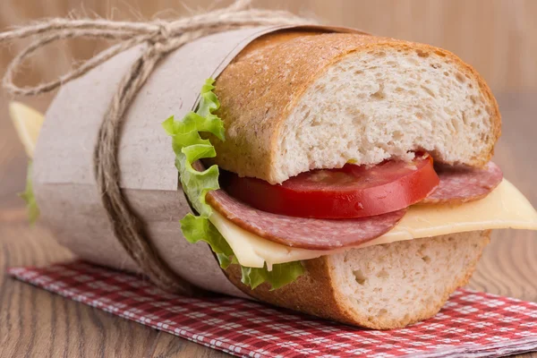 Sandwich with cheese and sausage — Stock Photo, Image