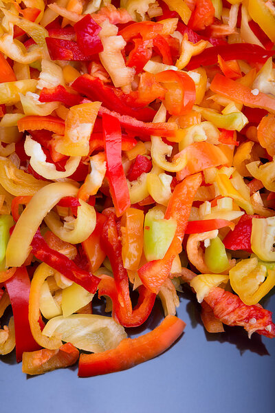 bell pepper slices on a polished table