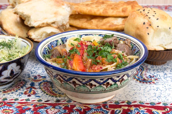 Lamian - Central Asian noodles cooked with mutton and vegetables — Stock Image Lamian - Central Asian noodles cooked with mutton and vegetables Royalty Free Stock Photos