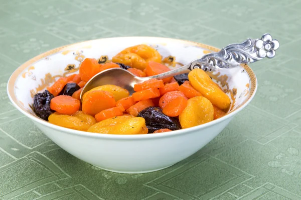 Tzimmes, tsimmes, stewed sweet carrots with dried fruit — Stock Photo, Image