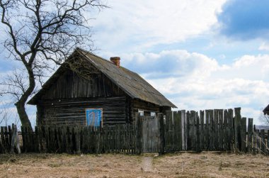 Rickety old wooden house in the countryside. Rural