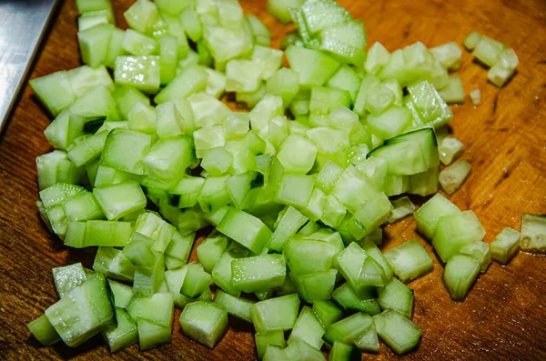 Finely Chopping Organic Seedless Cucumber Bamboo Cutting Board — Stock Photo, Image