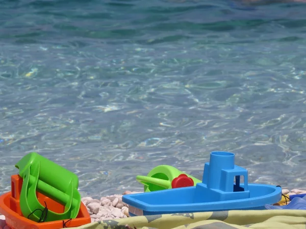 Toys on the sea — Stock Photo, Image