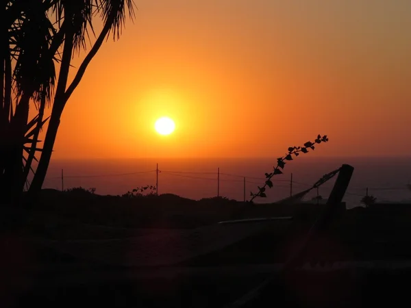 Una puesta de sol naranja — Foto de Stock