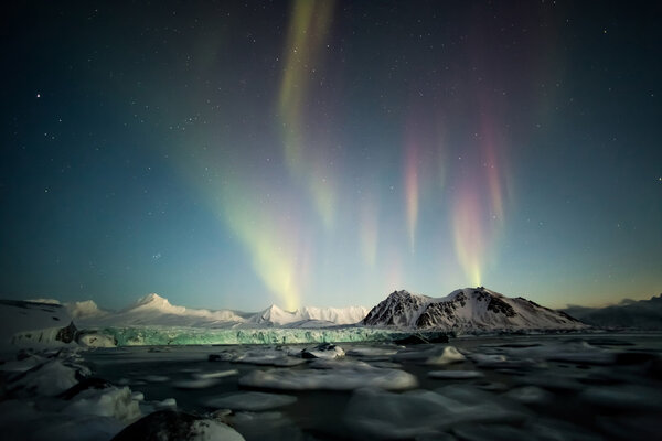 Northern Lights over the tidewater Arctic glacier - Spitsbergen