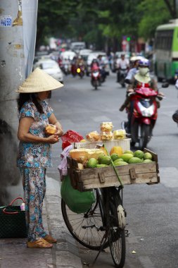  Bir Vietnam kadın meyve satıcı içinde eski şehir, Ho Chi Minh