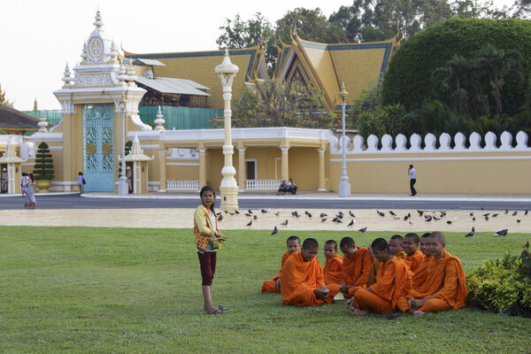 Young Buddhist monks in a garden, Phnom Penh, Cambodia