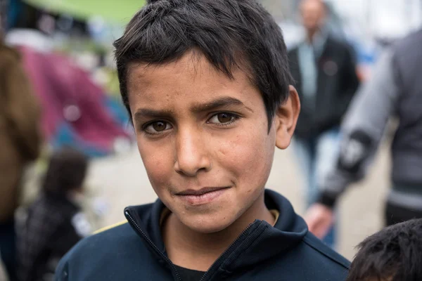 Niño en campo de refugiados en Grecia —  Fotos de Stock