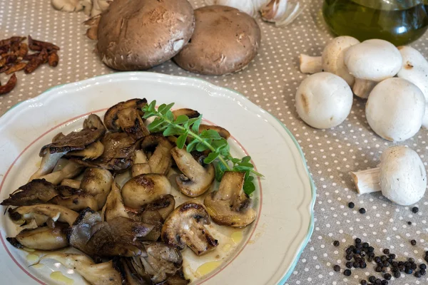 Plate of cooked mushrooms