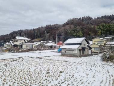 View of landscape Yufuin village in the winter after snow fall