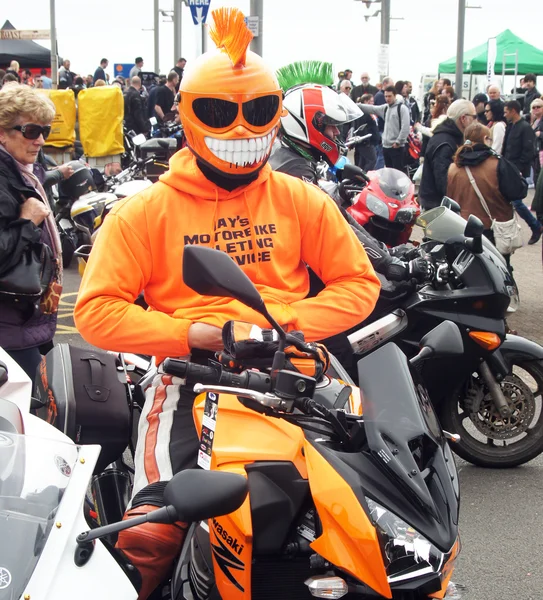 Biker in orange costume — Stock fotografie