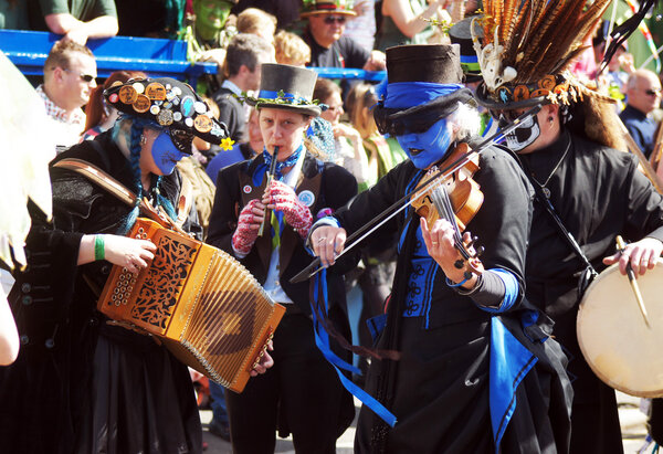 People play music in a carnival