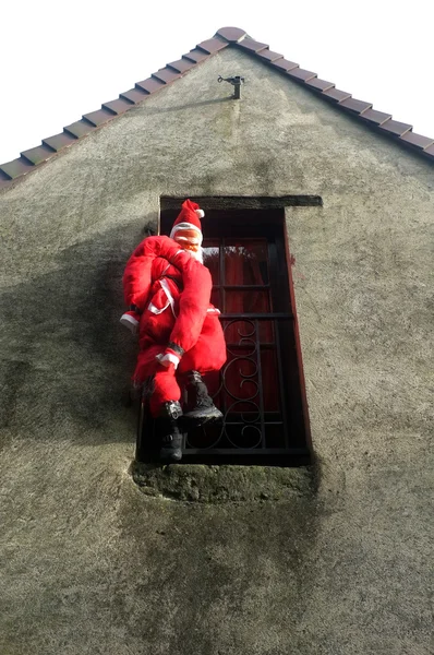 Santa puppet hanged on building — Stock Photo, Image