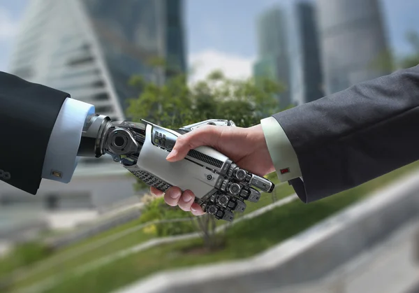 Üzleti digitális kommunikációs szimbólum emberi és robot kezek a kézfogásban — Stock Fotó