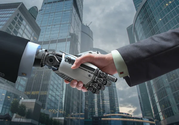 Business Digital Communication Symbol Human and Robot hands in handshake — Stock Photo, Image