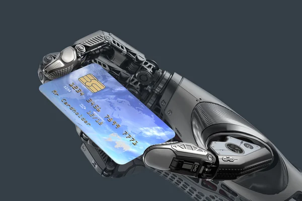 Робот держит в руках кредитную карту — стоковое фото