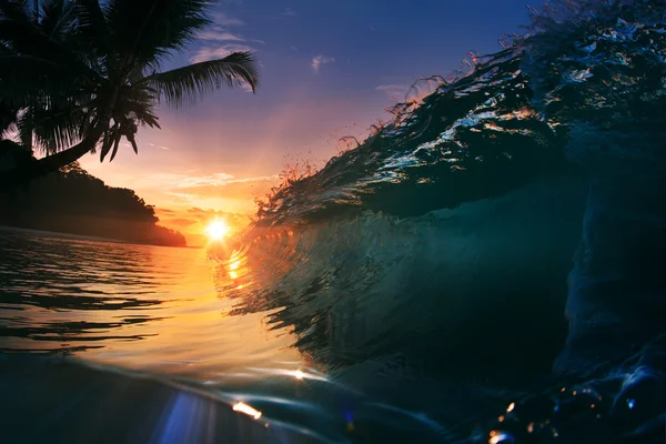 Beautiful ocean surfing wave at sunset beach — Stock Photo, Image