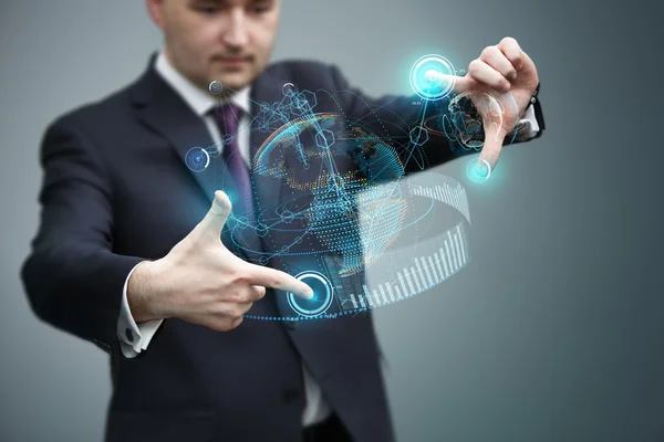 Businessman working with virtual holographic interface — Stock Photo, Image