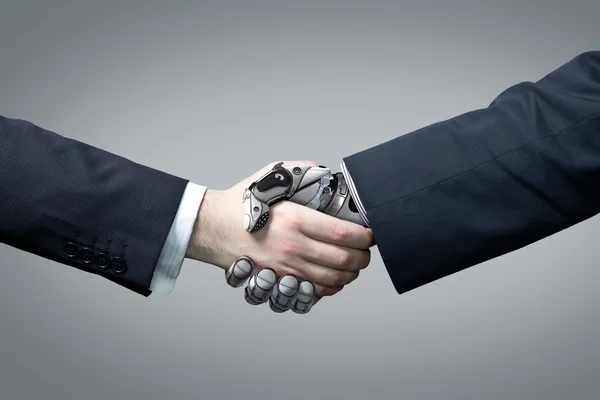 Business Human and Robot hands in handshake — Stok Foto