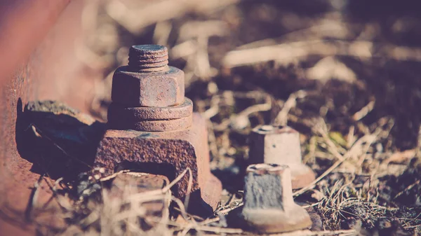 Old and lost Railroadtrack with nut and bolt — Stock Photo, Image