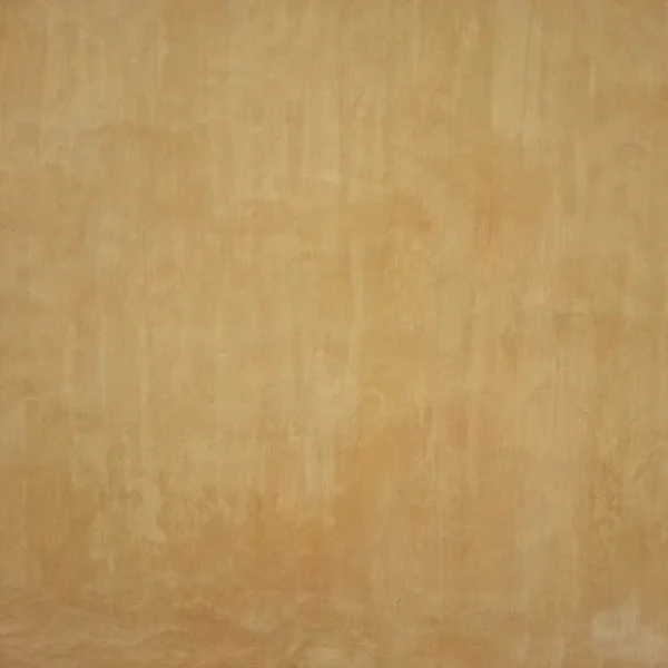Oranje grunge muur achtergrond — Stockfoto