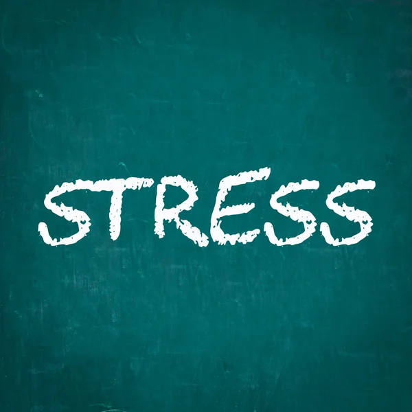 STRESS written on chalkboard — Stock Photo, Image