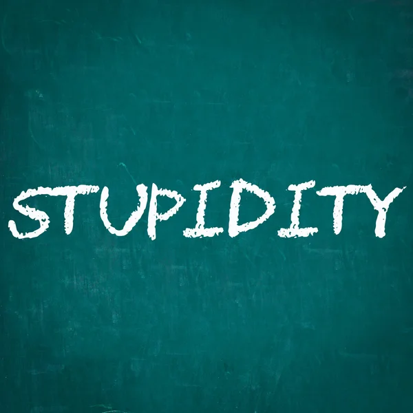 STUPIDITY written on chalkboard — Stock Photo, Image