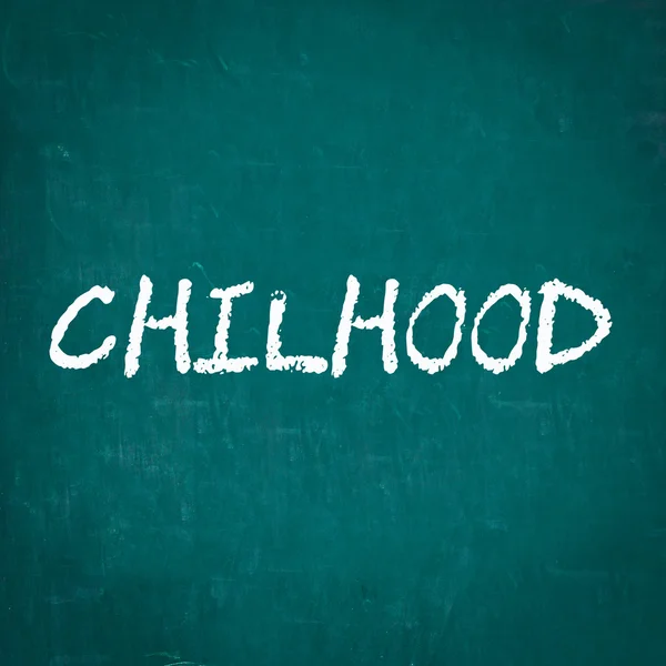 Chilhood geschreven op schoolbord — Stockfoto