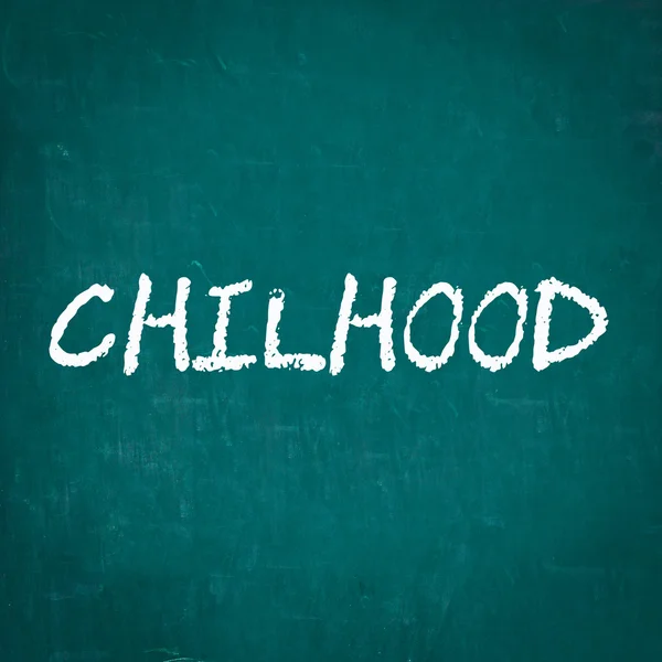 CHILHOOD escrito em quadro-negro — Fotografia de Stock