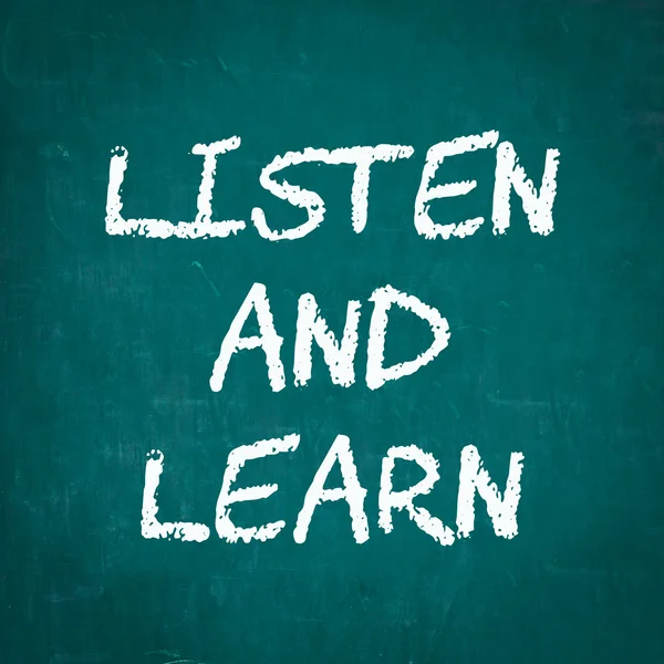 LISTEN AND LEARN written on chalkboard