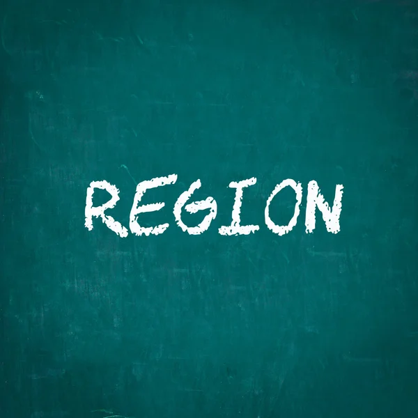 Region napsaný na tabuli — Stock fotografie
