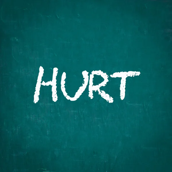 HURT escrito em quadro-negro — Fotografia de Stock